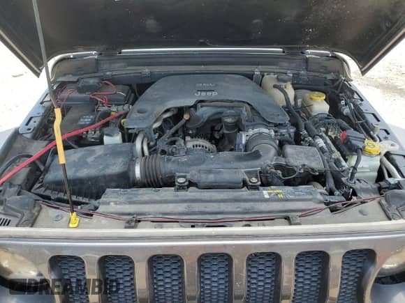 2020 Jeep Wrangler Sport S with VIN 1C4GJXAG8LW312195, listed as a Copart auction lot 57232285 with 102,233 mi miles and Salvage title. Bid and sale history available at DreamBid. Image 11.