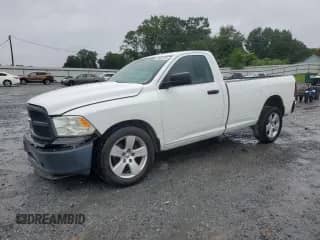 2012 Ram 1500 ST z VIN 3C6JD6DP4CG276904, wystawiony jako Copart lot #67687515 z przebiegiem 223 507 mil mil oraz Szkoda całkowita • Salvage title. Historia ofert i sprzedaży dostępna na DreamBid. Obrazek 1.
