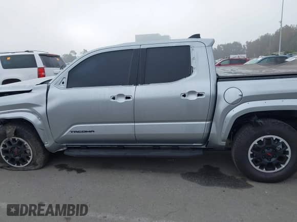 2024 Toyota Tacoma SR5 with VIN 3TMLB5JN6RM022612, listed as a IAAI auction lot 41611378 with 7,275 mi miles and . Bid and sale history available at DreamBid. Image 15.