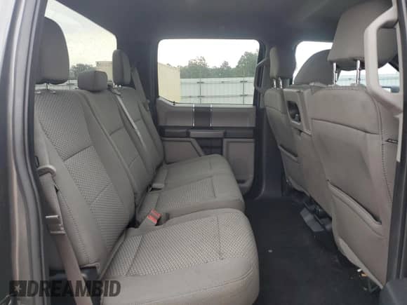 2019 Ford F-150 XL z VIN 1FTEW1C52JKC56969, wystawiony jako Copart lot #71099975 z przebiegiem 129 423 mil mil oraz Szkoda całkowita • Salvage title. Historia ofert i sprzedaży dostępna na DreamBid. Obrazek 10.