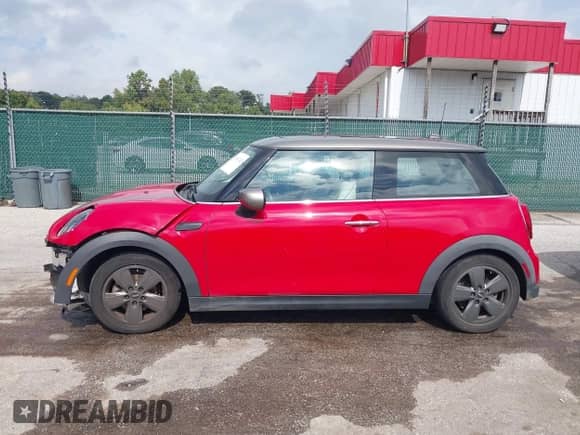 2022 MINI Hardtop Cooper z VIN WMW33DH00N2R91581, wystawiony jako IAAI lot #43315763 z przebiegiem 30 394 mil mil oraz . Historia ofert i sprzedaży dostępna na DreamBid. Obrazek 15.