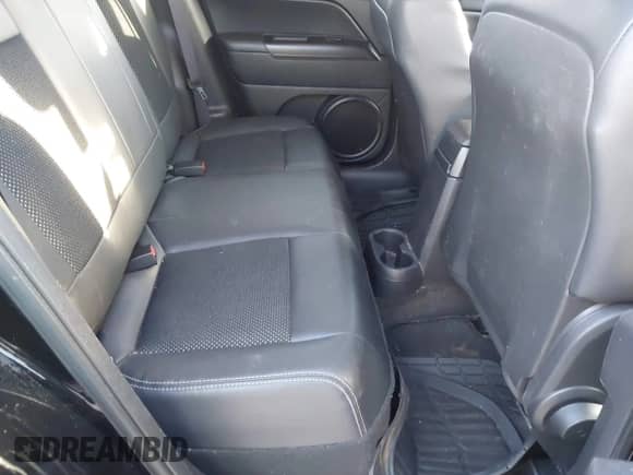 2014 Jeep Compass Sport with VIN 1C4NJCBA4ED785777, listed as a IAAI auction lot 43415977 with 146,175 mi miles and . Bid and sale history available at DreamBid. Image 8.