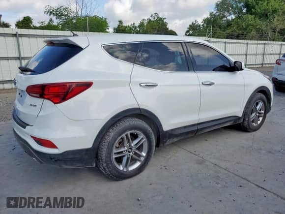 2018 Hyundai Santa Fe 2.4L с VIN 5NMZT3LB0JH058608, выставлен на аукционе Copart как лот 63779155 с пробегом 75 281 миль миль и Чистый • Clean title. История ставок и продаж доступна на DreamBid. Изображение 3.