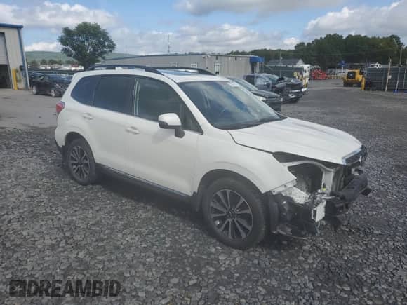 2017 Subaru Forester Touring z VIN JF2SJGWC0HH452397, wystawiony jako Copart lot #82097685 z przebiegiem 70 097 mil mil oraz Szkoda całkowita • Salvage title. Historia ofert i sprzedaży dostępna na DreamBid. Obrazek 4.