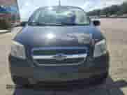 2011 Chevrolet Aveo 1LT with VIN KL1TD5DE6BB212954, listed as a Copart auction lot 69777165 with 33,543 mi miles and Salvage title. Bid and sale history available at DreamBid. Image 5.