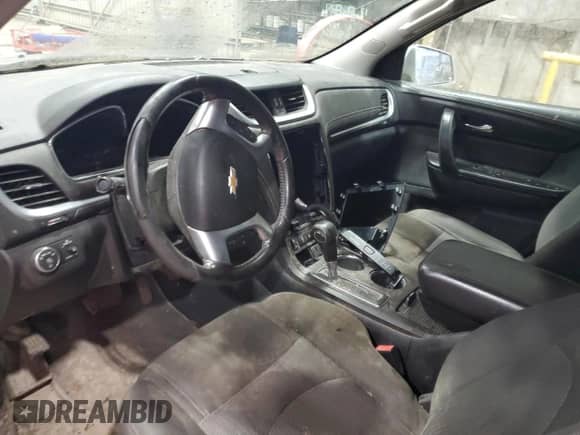 2016 Chevrolet Traverse LT z VIN 1GNKVHKD1GJ104744, wystawiony jako Copart lot #63876775 z przebiegiem Nie podano mil oraz Szkoda całkowita • Salvage title. Historia ofert i sprzedaży dostępna na DreamBid. Obrazek 8.