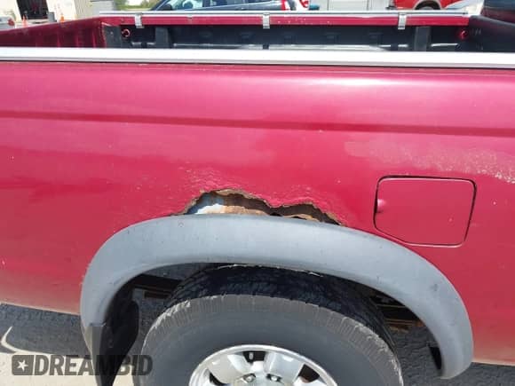 1998 Nissan Frontier XE z VIN 1N6DD26Y7WC378867, wystawiony jako IAAI lot #42187874 z przebiegiem Nie podano mil oraz . Historia ofert i sprzedaży dostępna na DreamBid. Obrazek 6.