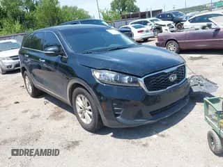 2019 Kia Sorento L with VIN 5XYPG4A31KG580821, listed as a IAAI auction lot 42836021 with 121,210 mi miles and . Bid and sale history available at DreamBid. Image 1.