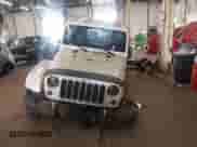 2012 Jeep Wrangler Arctic with VIN 1C4AJWBG9CL233232, listed as a IAAI auction lot 42282805 with 109,927 mi miles and . Bid and sale history available at DreamBid. Image 12.