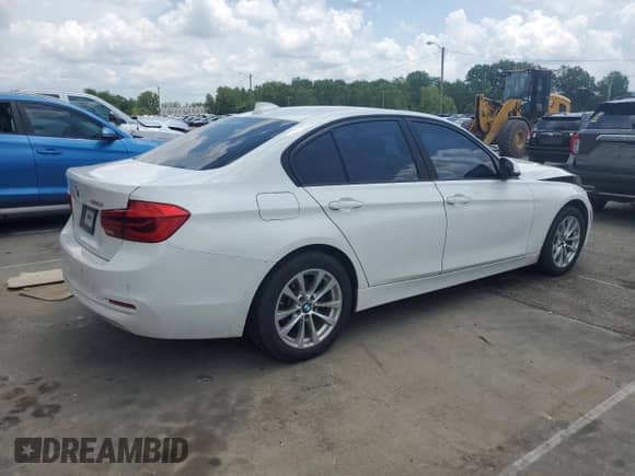 2016 BMW 3 Series 320i with VIN WBA8E1G59GNT99335, listed as a Copart auction lot 64949345 with 128,784 mi miles and Salvage title. Bid and sale history available at DreamBid. Image 3.