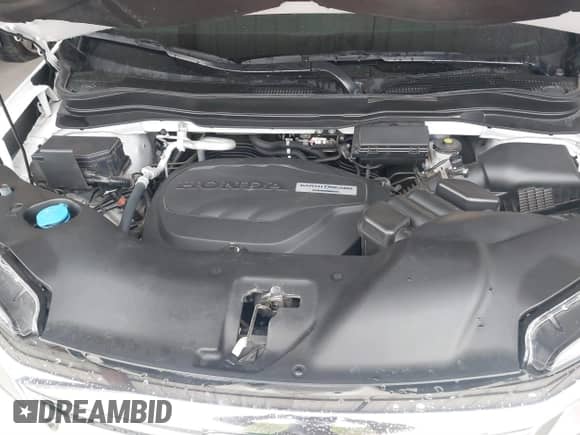 2020 Honda Pilot Touring 7-Passenger z VIN 5FNYF5H60LB026398, wystawiony jako IAAI lot #41294517 z przebiegiem 52 917 mil mil oraz . Historia ofert i sprzedaży dostępna na DreamBid. Obrazek 10.