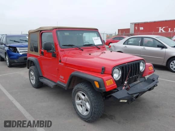2004 Jeep Wrangler Sport z VIN 1J4FA49S24P789424, wystawiony jako IAAI lot #43549917 z przebiegiem 163 340 mil mil oraz . Historia ofert i sprzedaży dostępna na DreamBid. Obrazek 1.