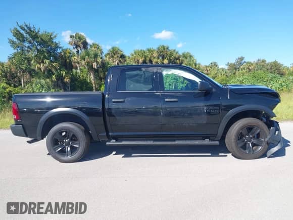 2022 Ram 1500 Warlock with VIN 1C6RR7LG4NS176356, listed as a IAAI auction lot 43423807 with 66,707 mi miles and . Bid and sale history available at DreamBid. Image 13.