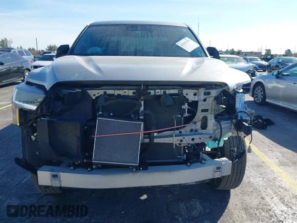 2024 Toyota Tundra SR5 with VIN 5TFLA5EC1RX022765, listed as a IAAI auction lot 41421939 with 30,946 mi miles and . Bid and sale history available at DreamBid. Image 6.