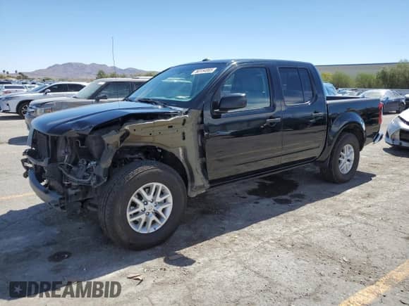 2016 Nissan Frontier SV with VIN 1N6AD0ER8GN736758, listed as a Copart auction lot 80154005 with 104,618 mi miles and Salvage title. Bid and sale history available at DreamBid. Image 1.