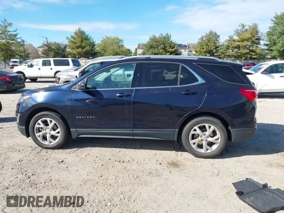 2020 Chevrolet Equinox LT with VIN 3GNAXVEX8LS620957, listed as a IAAI auction lot 43474526 with 36,061 mi miles and . Bid and sale history available at DreamBid. Image 14.