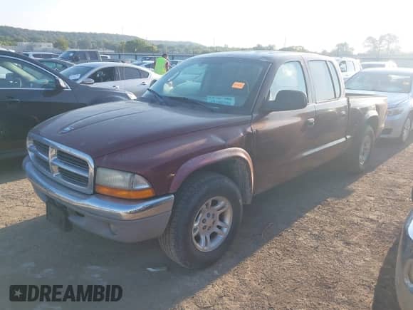 2003 Dodge Dakota SLT with VIN 1D7HL48N53S172265, listed as a IAAI auction lot 43190756 with 97,201 mi miles and . Bid and sale history available at DreamBid. Image 2.