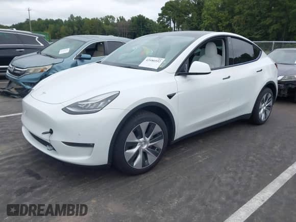 2022 Tesla Model Y Long Range z VIN 7SAYGDEE6NF317707, wystawiony jako IAAI lot #43186532 z przebiegiem 45 306 mil mil oraz . Historia ofert i sprzedaży dostępna na DreamBid. Obrazek 21.