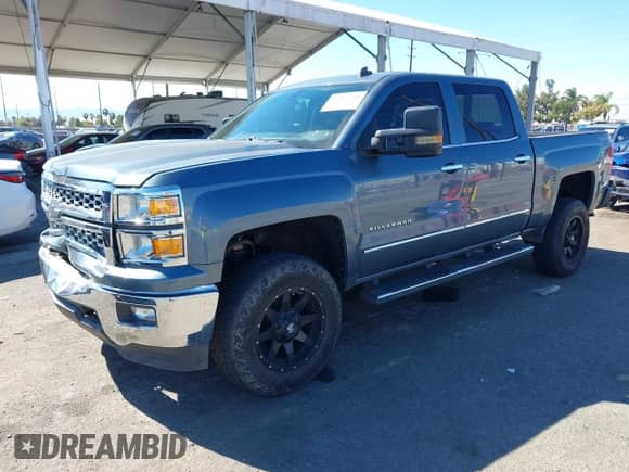 2014 Chevrolet Silverado 1500 LT with VIN 3GCUKREC2EG399421, listed as a IAAI auction lot 43487244 with 77,829 mi miles and . Bid and sale history available at DreamBid. Image 2.