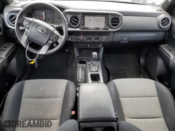 2020 Toyota Tacoma SR with VIN 3TMCZ5AN1LM289045, listed as a Copart auction lot 61625115 with 44,300 mi miles and Salvage title. Bid and sale history available at DreamBid. Image 8.
