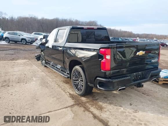 2022 Chevrolet Silverado 1500 High Country with VIN 3GCUYHEL8NG199801, listed as a IAAI auction lot 41256206 with 26,093 mi miles and . Bid and sale history available at DreamBid. Image 3.
