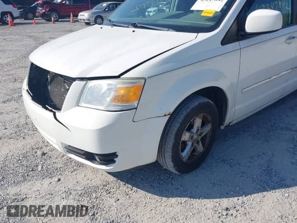 2009 Dodge Grand Caravan SXT with VIN 2D8HN54139R583365, listed as a IAAI auction lot 43247842 with 174,640 mi miles and . Bid and sale history available at DreamBid. Image 13.
