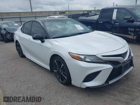 2019 Toyota Camry XSE z VIN 4T1BZ1HK3KU021989, wystawiony jako IAAI lot #42893742 z przebiegiem 92 112 mil mil oraz . Historia ofert i sprzedaży dostępna na DreamBid. Obrazek 1.