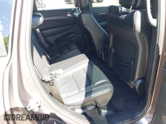 2017 Jeep Grand Cherokee Limited with VIN 1C4RJEBG9HC902975, listed as a IAAI auction lot 42972015 with 100,560 mi miles and . Bid and sale history available at DreamBid. Image 8.