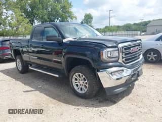 2018 GMC Sierra 1500 SLE z VIN 1GTV2MEC4JZ376286, wystawiony jako IAAI lot #42978061 z przebiegiem 115 997 mil mil oraz . Historia ofert i sprzedaży dostępna na DreamBid. Obrazek 1.