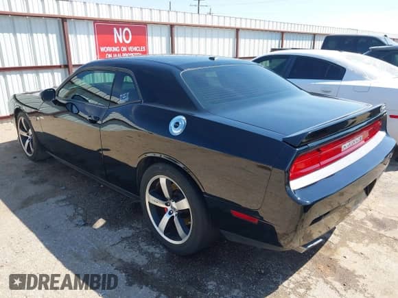 2013 Dodge Challenger SRT-8 with VIN 2C3CDYCJ3DH587739, listed as a IAAI auction lot 43148385 with 60,177 mi miles and . Bid and sale history available at DreamBid. Image 3.