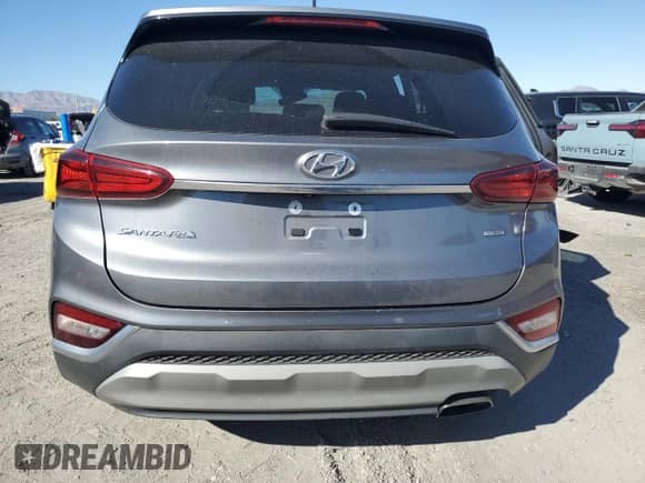 2019 Hyundai Santa Fe SE z VIN 5NMS2CAD3KH095873, wystawiony jako Copart lot #85199995 z przebiegiem 68 309 mil mil oraz Szkoda całkowita • Salvage title. Historia ofert i sprzedaży dostępna na DreamBid. Obrazek 6.