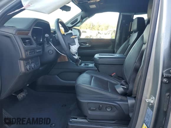 2023 Chevrolet Suburban High Country with VIN 1GNSKGKL9PR328923, listed as a Copart auction lot 77671964 with 32,395 mi miles and Salvage title. Bid and sale history available at DreamBid. Image 7.