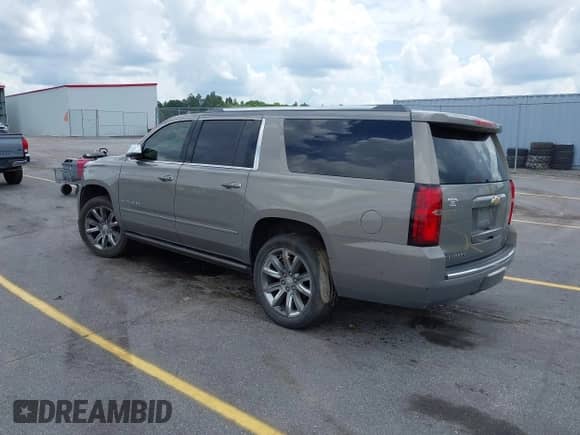 2017 Chevrolet Suburban Premier with VIN 1GNSCJKC7HR271486, listed as a IAAI auction lot 42480343 with 161,133 mi miles and . Bid and sale history available at DreamBid. Image 3.