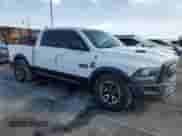 2018 Ram 1500 Rebel z VIN 1C6RR7YT7JS235965, wystawiony jako Copart lot #64030615 z przebiegiem 61 485 mil mil oraz Szkoda całkowita • Salvage title. Historia ofert i sprzedaży dostępna na DreamBid. Obrazek 4.
