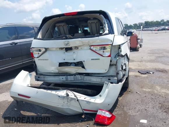 2012 Honda Odyssey Touring с VIN 5FNRL5H99CB115300, выставлен на аукционе IAAI как лот 42890660 с пробегом 120 808 миль миль и . История ставок и продаж доступна на DreamBid. Изображение 16.