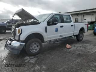 2019 Ford F-250 XL with VIN 1FT7W2B69KEF52676, listed as a Copart auction lot 85700235 with 119,206 mi miles and Salvage title. Bid and sale history available at DreamBid. Image 1.