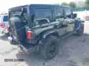 2021 Jeep Wrangler Unlimited Sahara z VIN 1C4JJXP63MW767719, wystawiony jako IAAI lot #41906155 z przebiegiem 44 689 mil mil oraz . Historia ofert i sprzedaży dostępna na DreamBid. Obrazek 4.