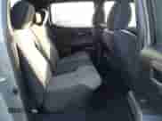2023 Toyota Tacoma SR z VIN 3TMCZ5AN9PM626034, wystawiony jako IAAI lot #43517093 z przebiegiem 35 131 mil mil oraz . Historia ofert i sprzedaży dostępna na DreamBid. Obrazek 8.