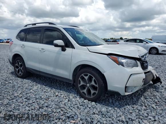 2014 Subaru Forester XT Touring with VIN JF2SJGPCXEH431227, listed as a Copart auction lot 66078405 with 98,060 mi miles and Salvage title. Bid and sale history available at DreamBid. Image 4.