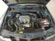 1994 Dodge Spirit with VIN 3B3AA4638RT310022, listed as a Copart auction lot 63479515 with 157,435 mi miles and Salvage title. Bid and sale history available at DreamBid. Image 11.