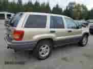 2001 Jeep Grand Cherokee Laredo с VIN 1J4GW48S51C595710, выставлен на аукционе Copart как лот 82590275 с пробегом 71 420 миль миль и Списание • Salvage title. История ставок и продаж доступна на DreamBid. Изображение 3.