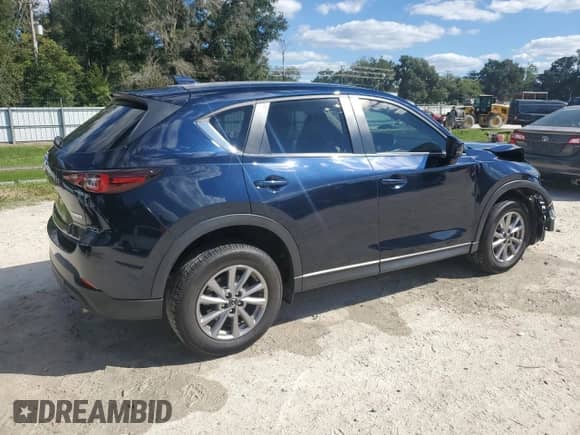 2023 Mazda CX-5 S Select z VIN JM3KFBBMXP0260507, wystawiony jako Copart lot #86469825 z przebiegiem 54 029 mil mil oraz Szkoda całkowita • Salvage title. Historia ofert i sprzedaży dostępna na DreamBid. Obrazek 3.