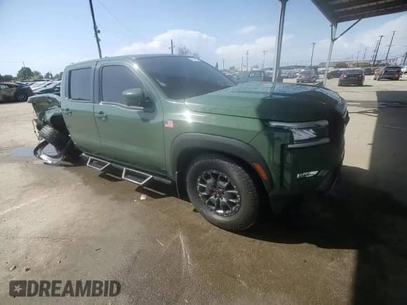 2023 Nissan Frontier Pro-X with VIN 1N6ED1EJ6PN670843, listed as a Copart auction lot 51841865 with 8,825 mi miles and Salvage title. Bid and sale history available at DreamBid. Image 11.