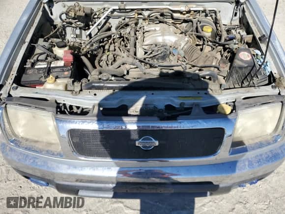 2000 Nissan Frontier XE with VIN 1N6ED27Y3YC359853, listed as a Copart auction lot 67466045 with 128,744 mi miles and Salvage title. Bid and sale history available at DreamBid. Image 11.