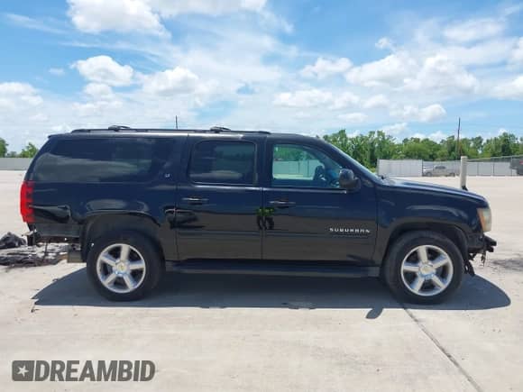 2013 Chevrolet Suburban LT with VIN 1GNSKJE71DR168382, listed as a IAAI auction lot 42821206 with 209,210 mi miles and . Bid and sale history available at DreamBid. Image 13.