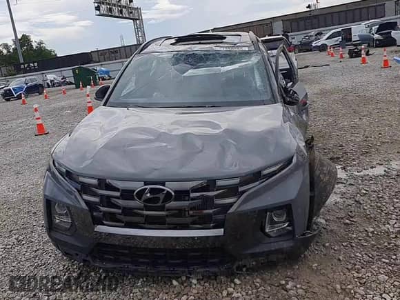 2023 Hyundai Santa Cruz Night Edition с VIN 5NTJCDAF8PH060564, выставлен на аукционе Copart как лот 61330885 с пробегом 45 026 миль миль и Списание • Salvage title. История ставок и продаж доступна на DreamBid. Изображение 13.