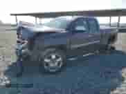 2011 Chevrolet Silverado 1500 LT with VIN 1GCRCSE00BZ145282, listed as a Copart auction lot 87397805 with 179,752 mi miles and Salvage title. Bid and sale history available at DreamBid. Image 1.