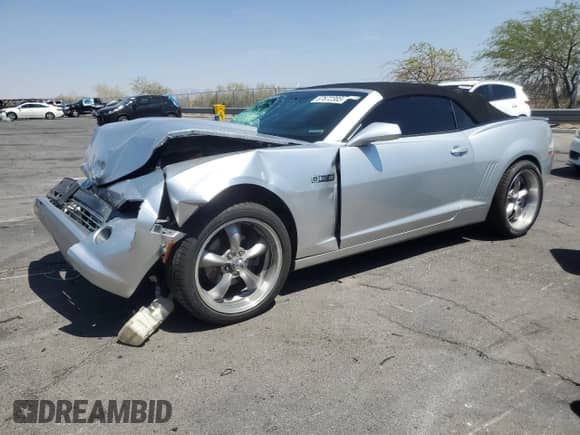 2014 Chevrolet Camaro LT z VIN 2G1FB3D30E9140985, wystawiony jako Copart lot #67672385 z przebiegiem 117 076 mil mil oraz Szkoda całkowita • Salvage title. Historia ofert i sprzedaży dostępna na DreamBid. Obrazek 1.