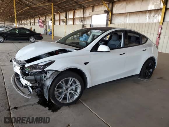 2023 Tesla Model Y Long Range with VIN 7SAYGAEE4PF833503, listed as a Copart auction lot 62376755 with 16,920 mi miles and Salvage title. Bid and sale history available at DreamBid. Image 1.