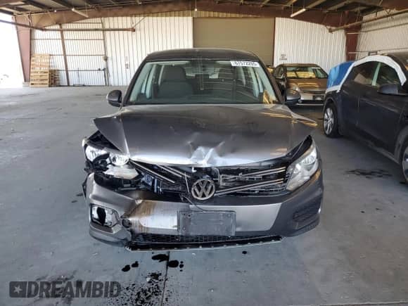 2014 Volkswagen Tiguan S z VIN WVGAV3AX8EW556155, wystawiony jako Copart lot #67572205 z przebiegiem 151 963 mil mil oraz Szkoda całkowita • Salvage title. Historia ofert i sprzedaży dostępna na DreamBid. Obrazek 5.